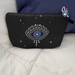 Evil eye makeup or stash bag